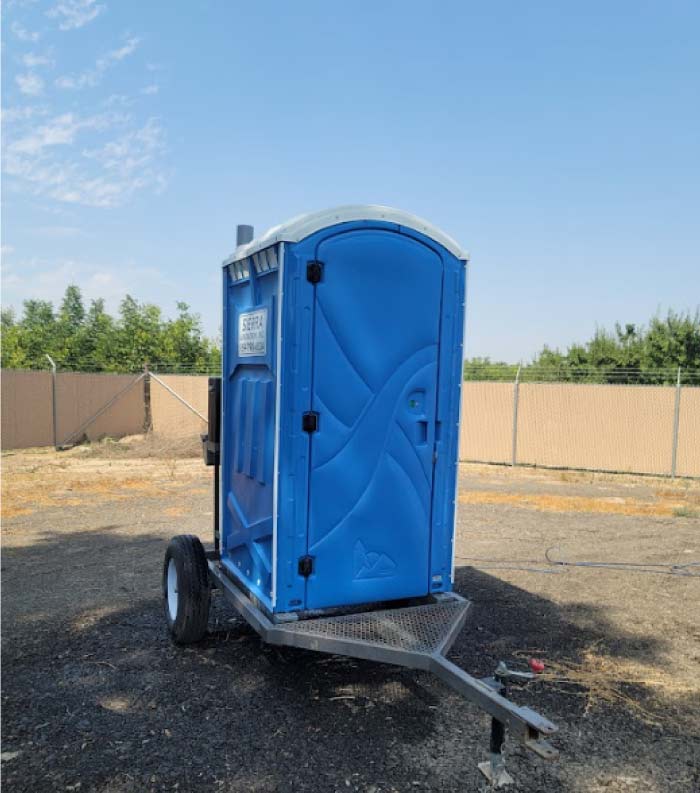 single-portable-toilet-trailer-rentals A clean, well-maintained single portable toilet trailer at a Visalia, CA event.