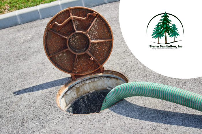 septic tank pumping truck with porta potties on the back